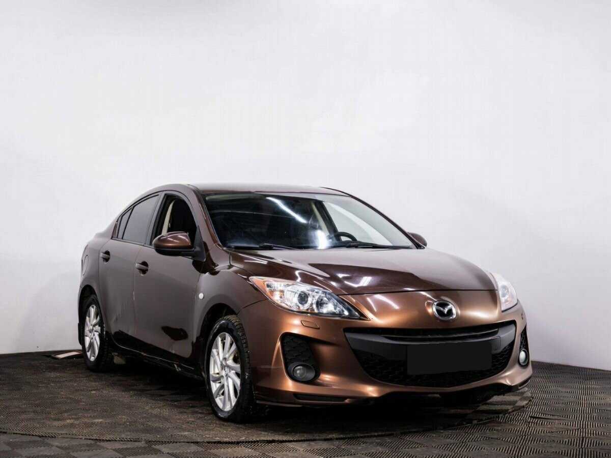 Mazda 3 с пробегом — 2012 год. Фото: #2