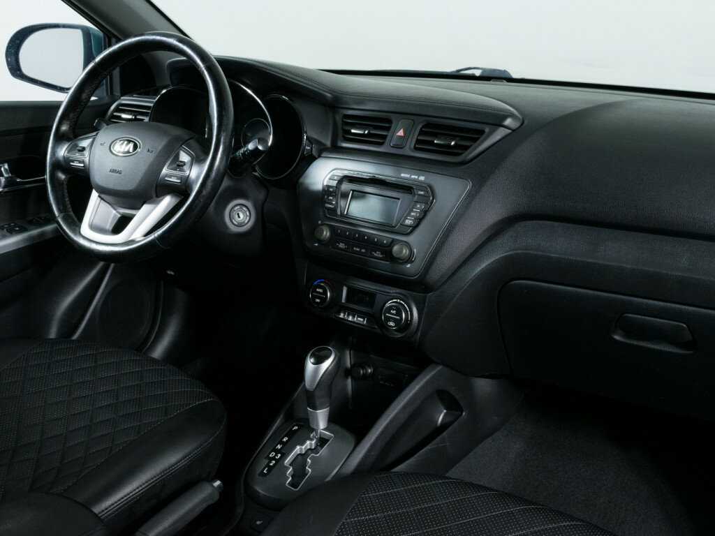 Kia Rio с пробегом — 2013 год. Фото: #6