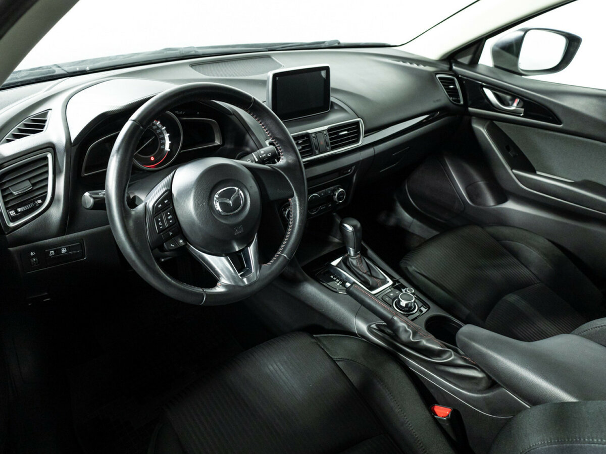 Mazda 3 с пробегом — 2013 год. Фото: #10