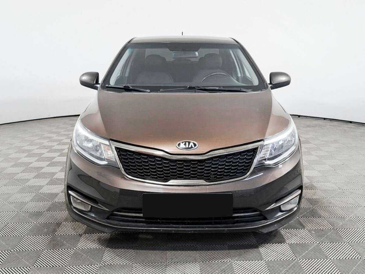 Kia Rio с пробегом — 2015 год. Фото: #1