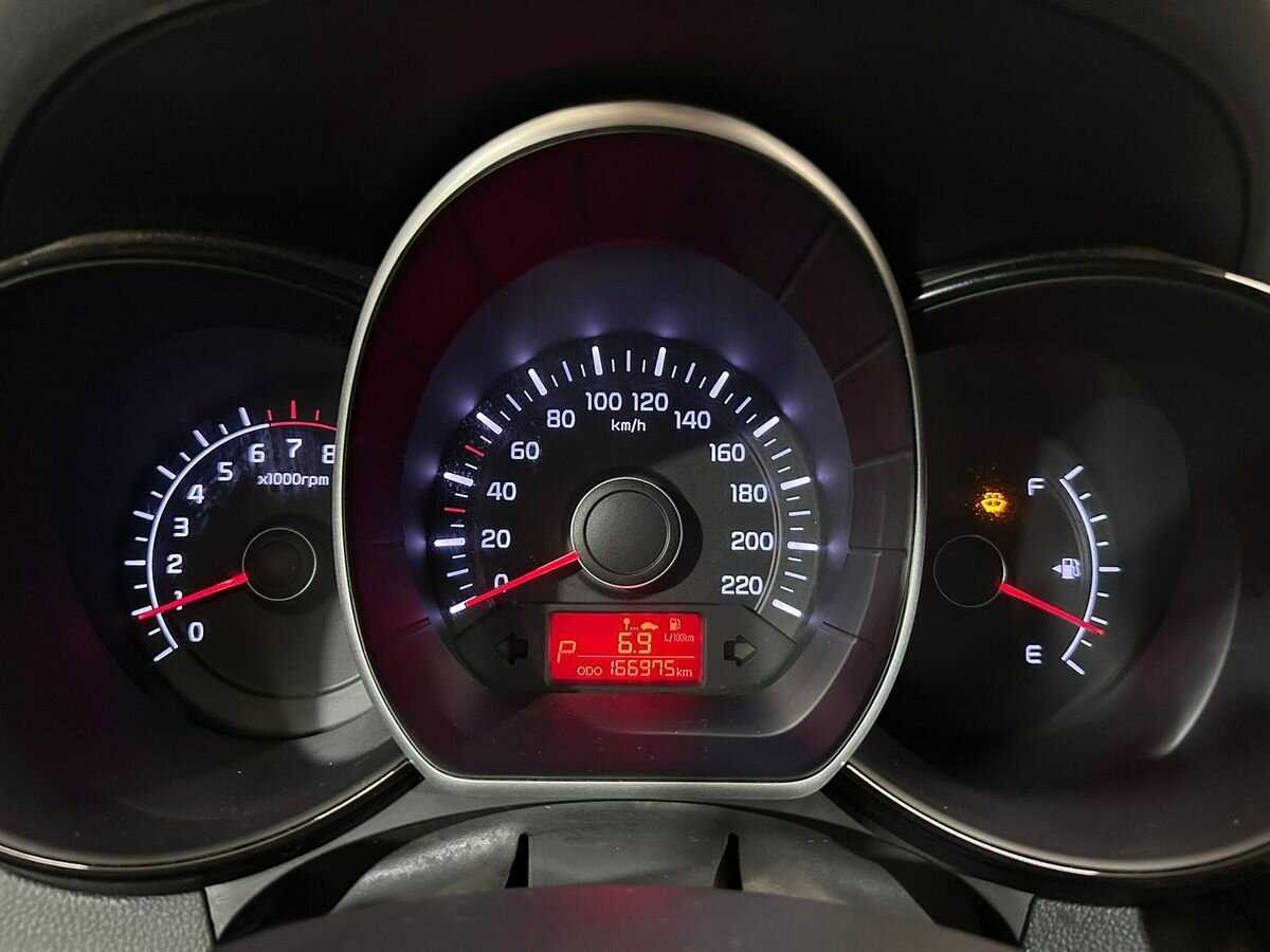 Kia Rio с пробегом — 2013 год. Фото: #11