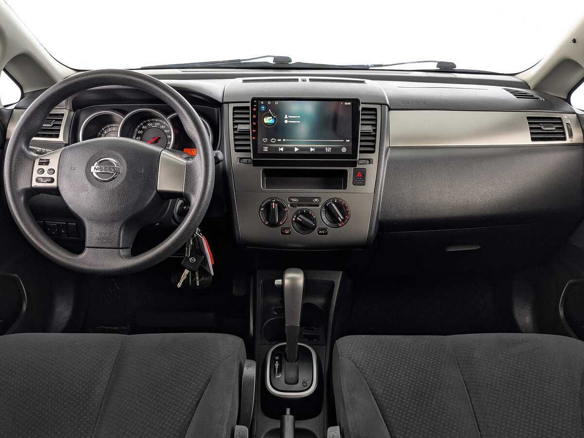 Nissan Tiida с пробегом — 2013 год. Фото: #13