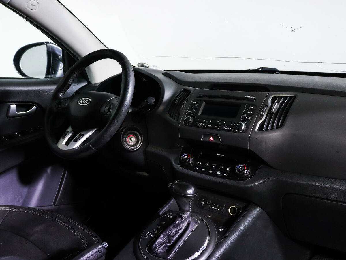 Kia Sportage с пробегом — 2012 год. Фото: #6