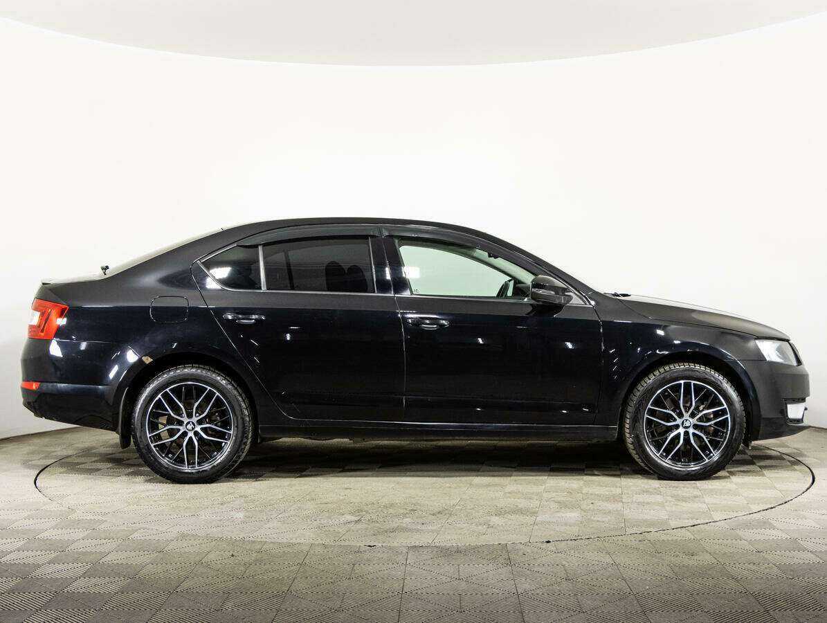 Skoda Octavia с пробегом — 2014 год. Фото: #3