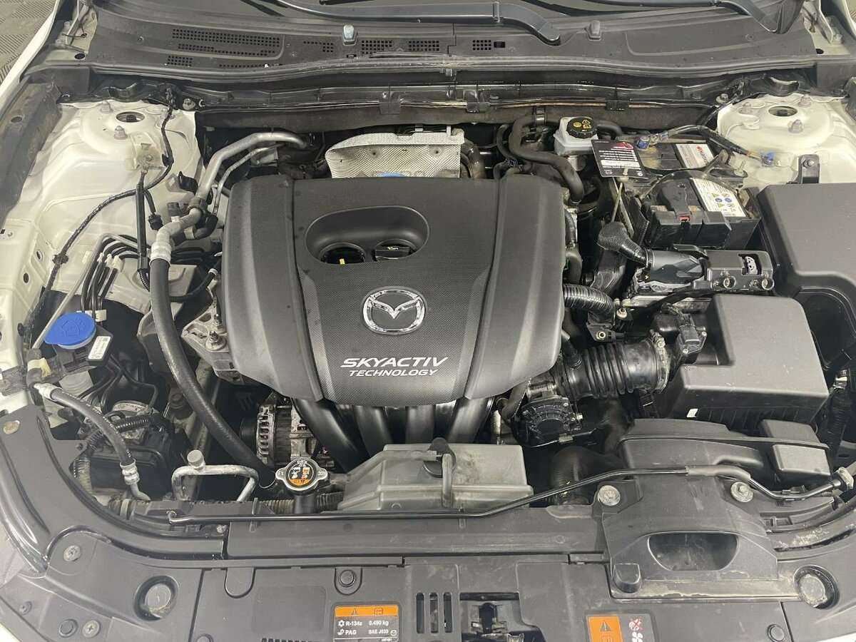 Mazda 3 с пробегом — 2014 год. Фото: #14