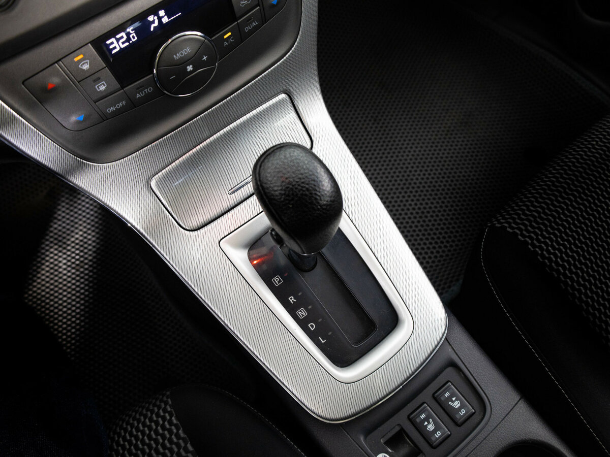 Nissan Tiida с пробегом — 2015 год. Фото: #12