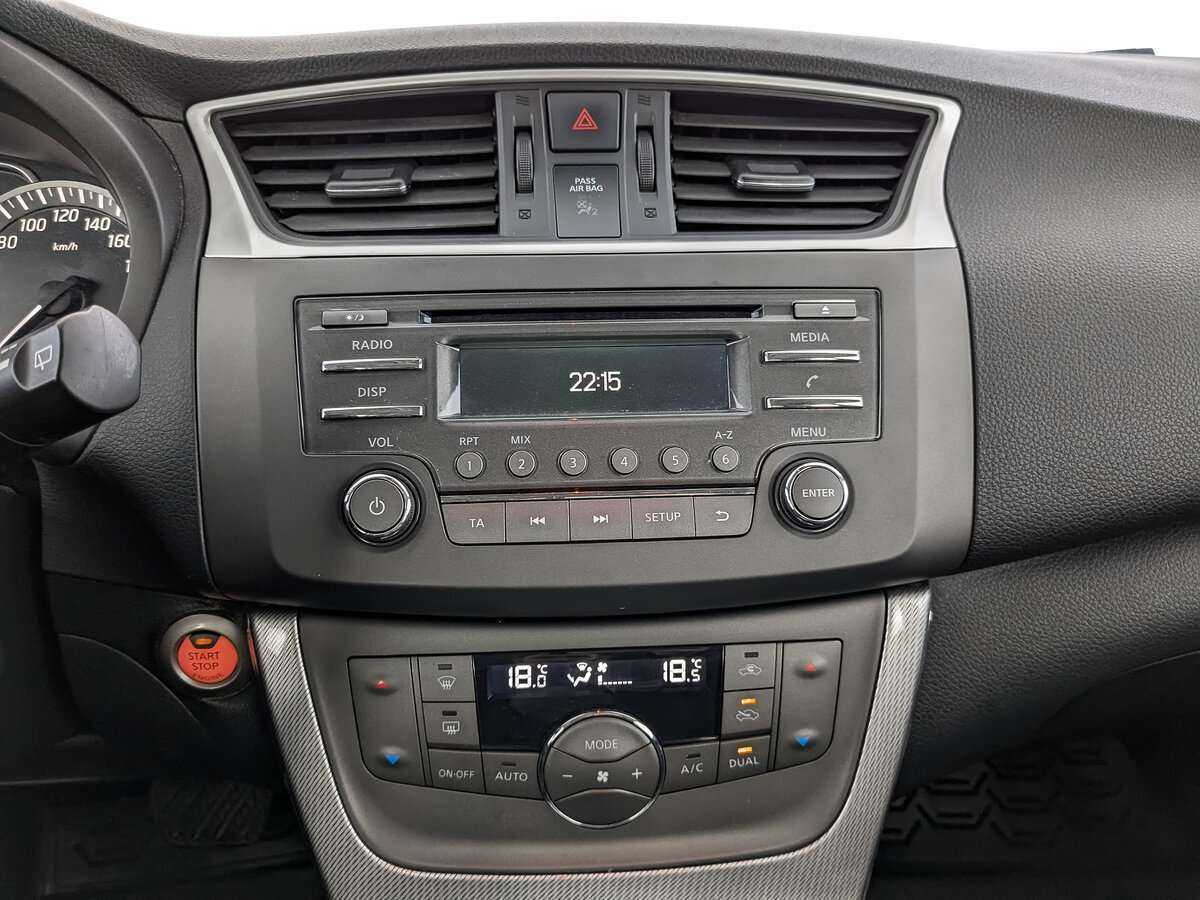 Nissan Tiida с пробегом — 2015 год. Фото: #12