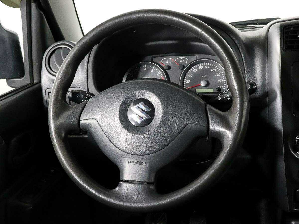 Suzuki Jimny с пробегом — 2013 год. Фото: #11
