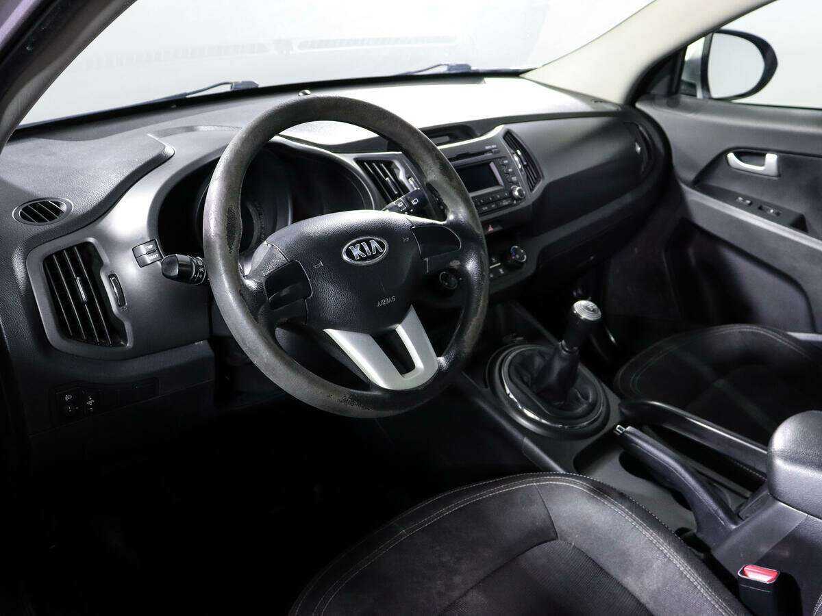 Kia Sportage с пробегом — 2012 год. Фото: #11