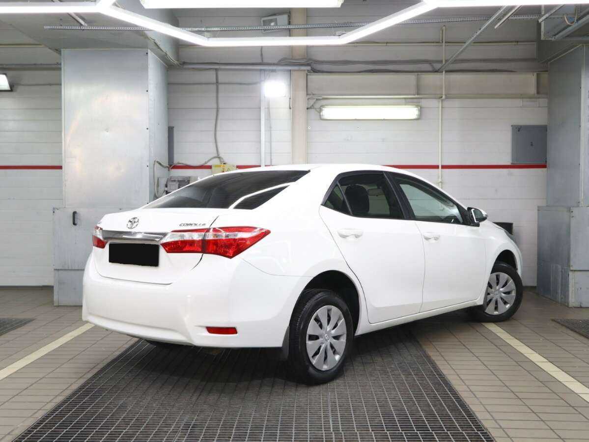 Toyota Corolla с пробегом — 2014 год. Фото: #1