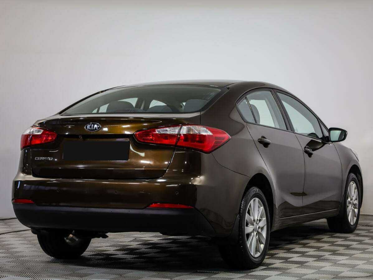 Kia Cerato с пробегом — 2015 год. Фото: #3