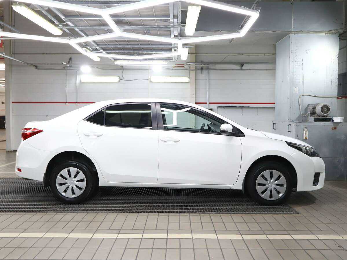 Toyota Corolla с пробегом — 2014 год. Фото: #10