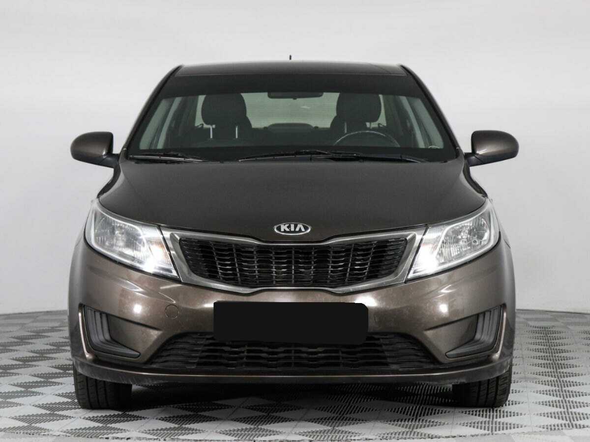 Kia Rio с пробегом — 2014 год. Фото: #1
