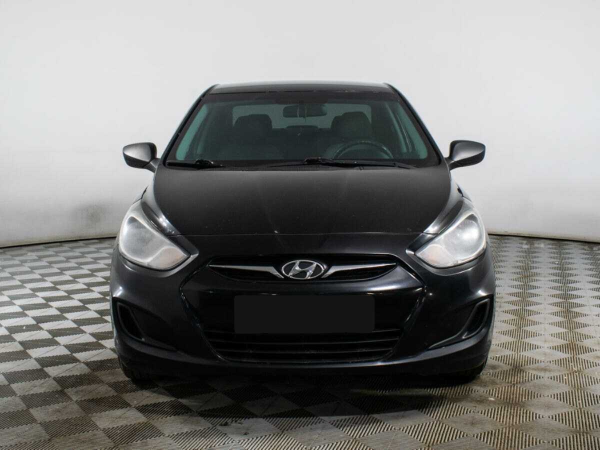 Hyundai Solaris с пробегом — 2013 год. Фото: #1