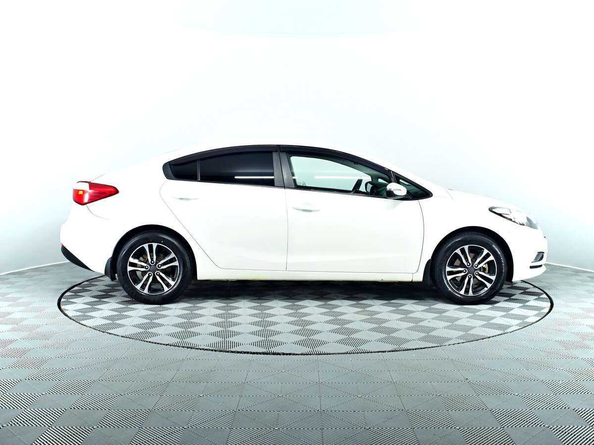 Kia Cerato с пробегом — 2014 год. Фото: #3