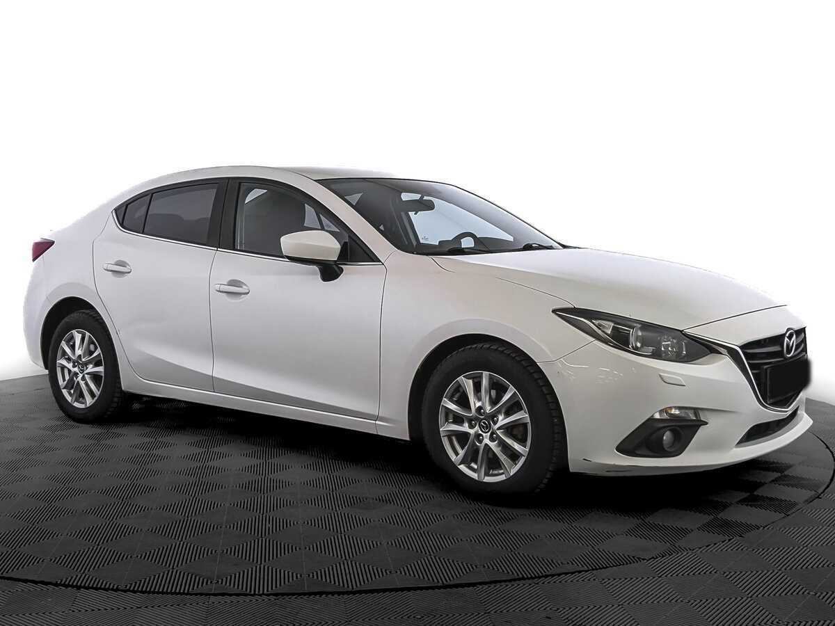 Mazda 3 с пробегом — 2015 год. Фото: #2