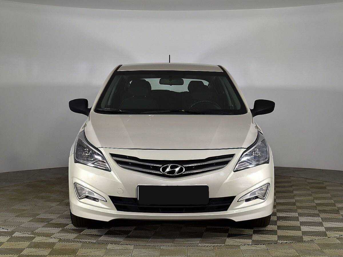 Hyundai Solaris с пробегом — 2014 год. Фото: #2