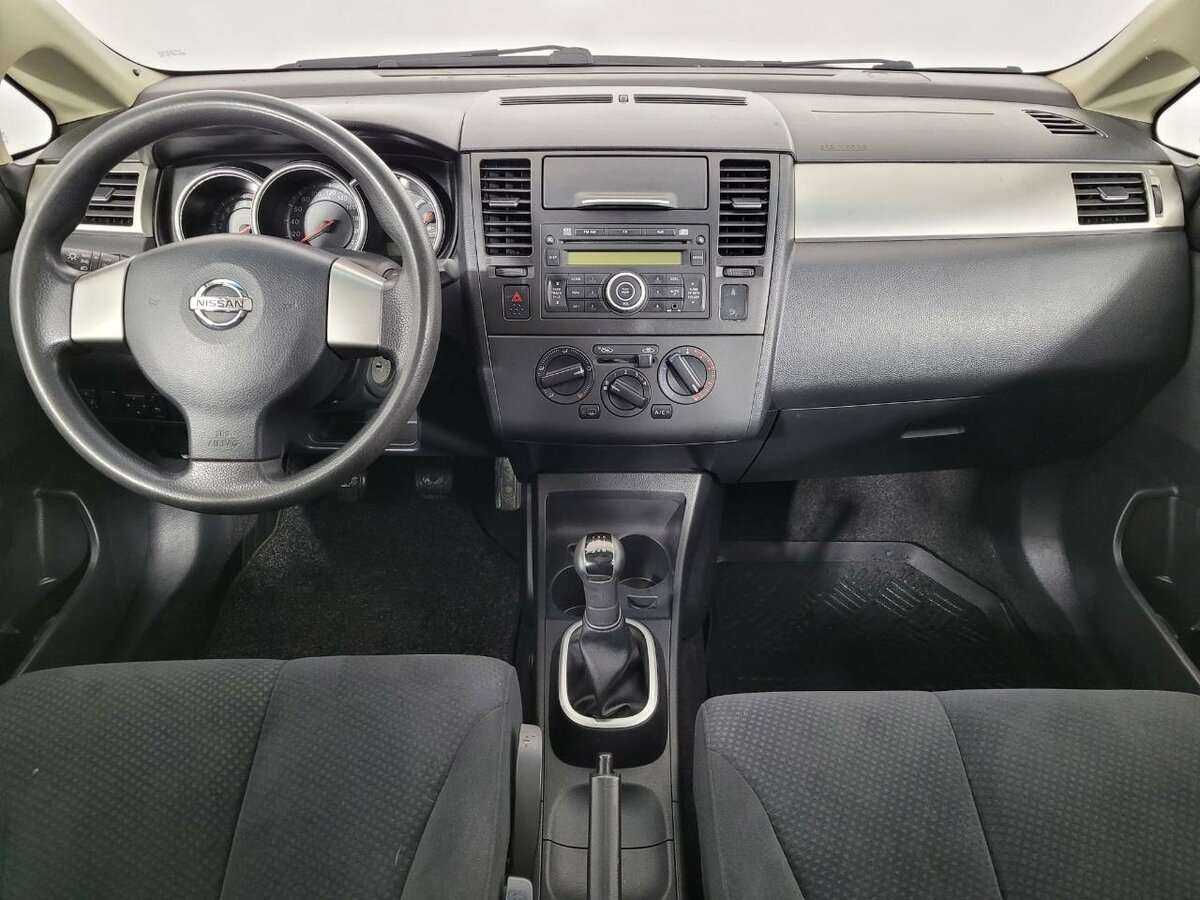 Nissan Tiida с пробегом — 2013 год. Фото: #6