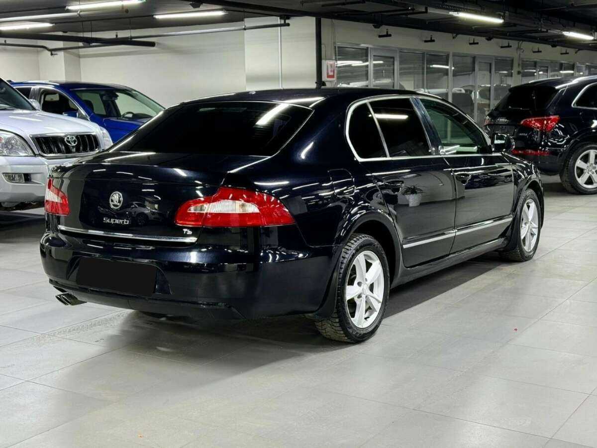 Skoda Superb с пробегом — 2013 год. Фото: #2