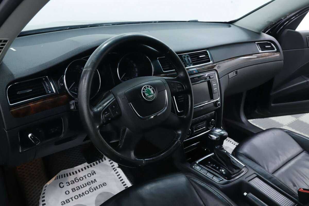 Skoda Superb с пробегом — 2013 год. Фото: #7