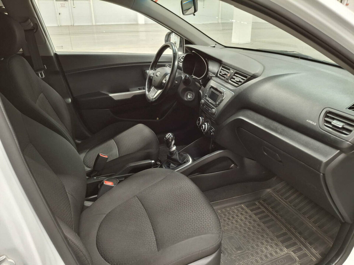 Kia Rio с пробегом — 2014 год. Фото: #10