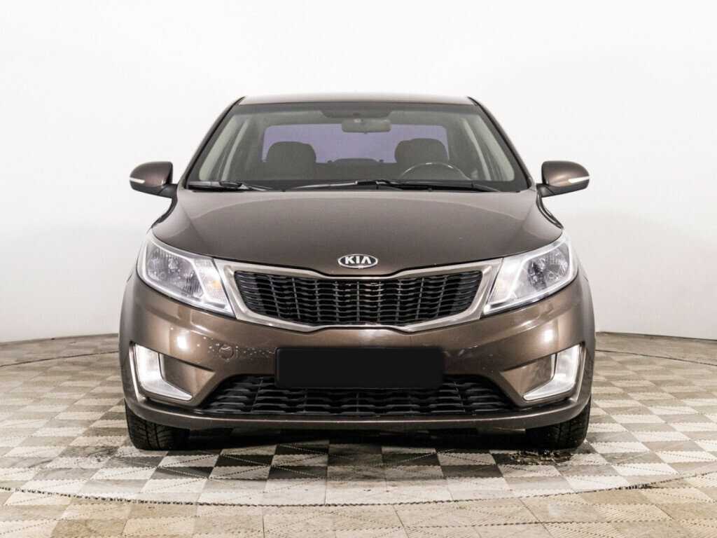 Kia Rio с пробегом — 2015 год. Фото: #1