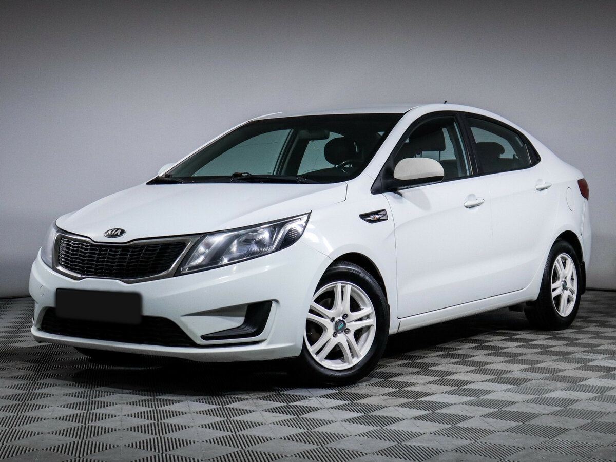 Kia Rio с пробегом — 2014 год. Фото: #0