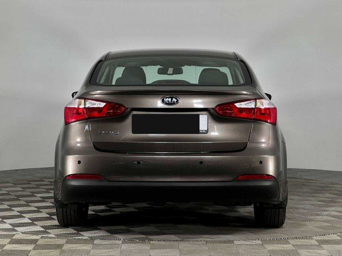 Kia Cerato с пробегом — 2014 год. Фото: #3