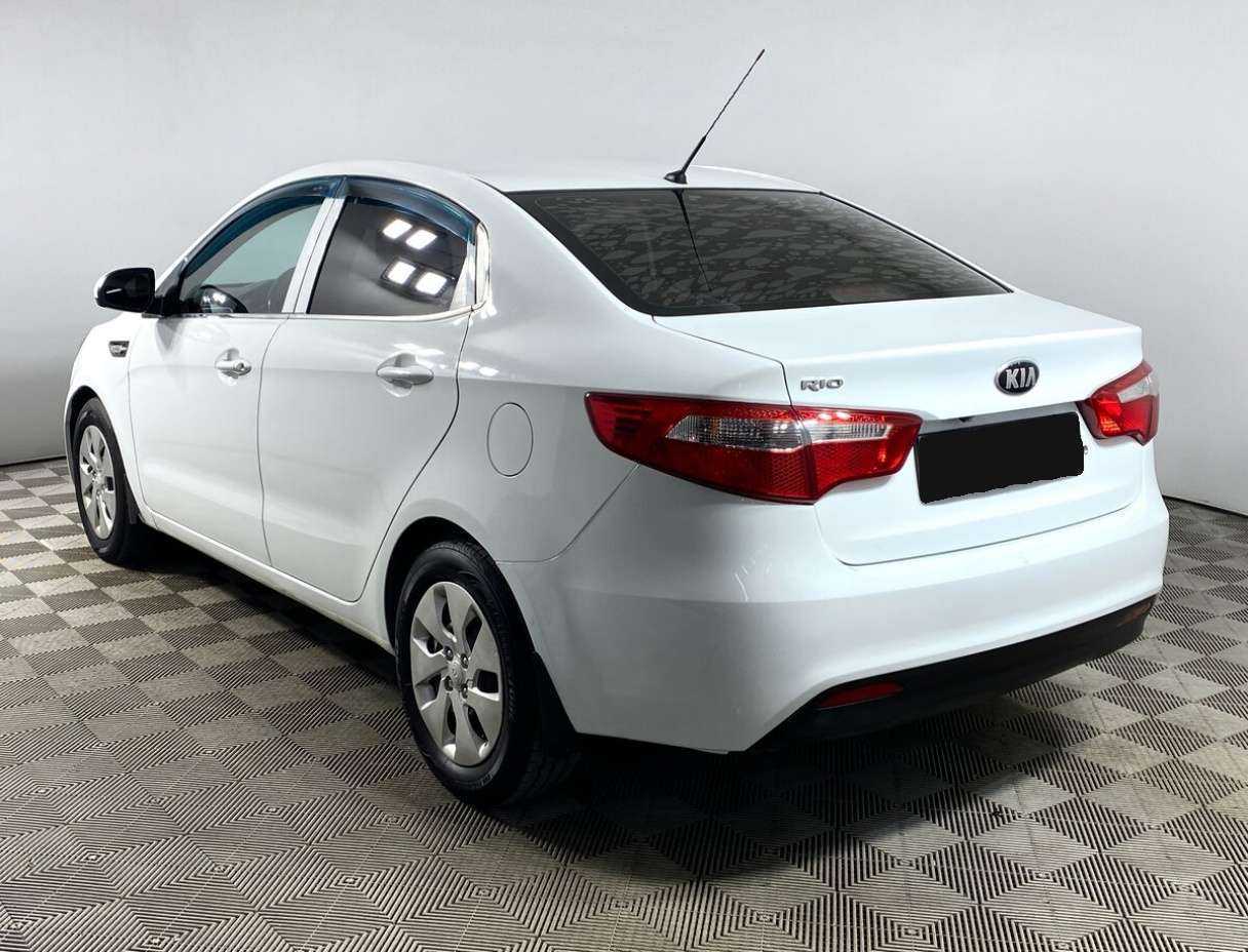 Kia Rio с пробегом — 2014 год. Фото: #6