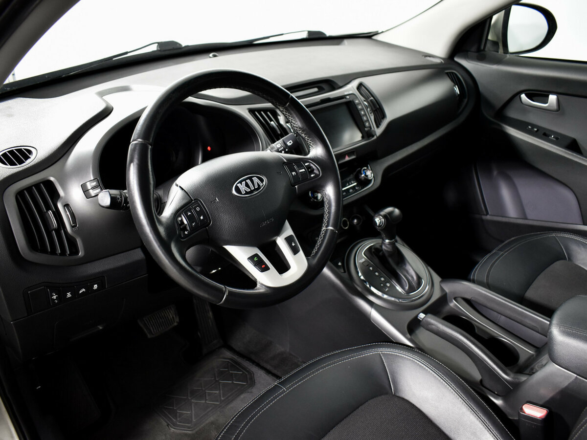 Kia Sportage с пробегом — 2013 год. Фото: #8