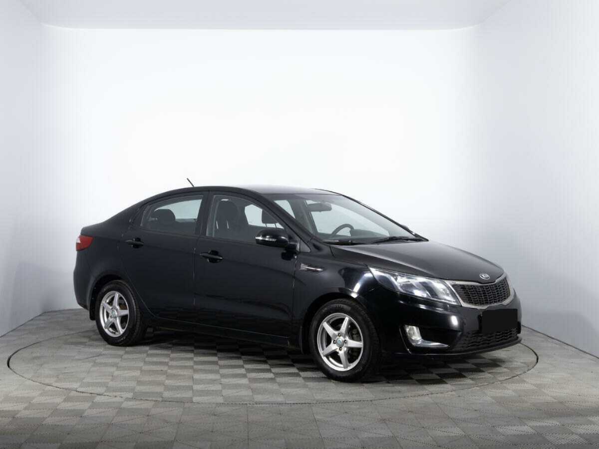 Kia Rio с пробегом — 2014 год. Фото: #2