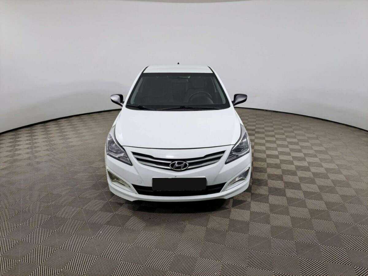 Hyundai Solaris с пробегом — 2014 год. Фото: #1