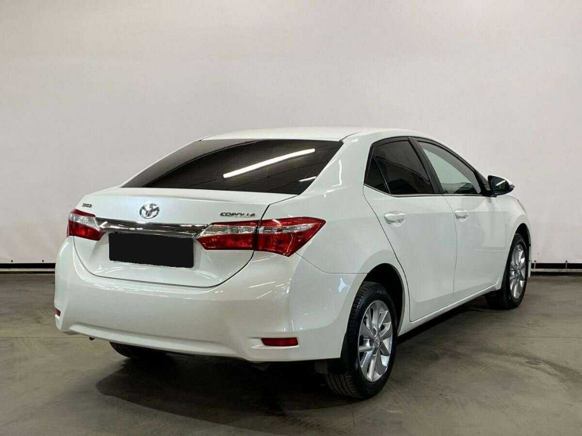 Toyota Corolla с пробегом — 2014 год. Фото: #4