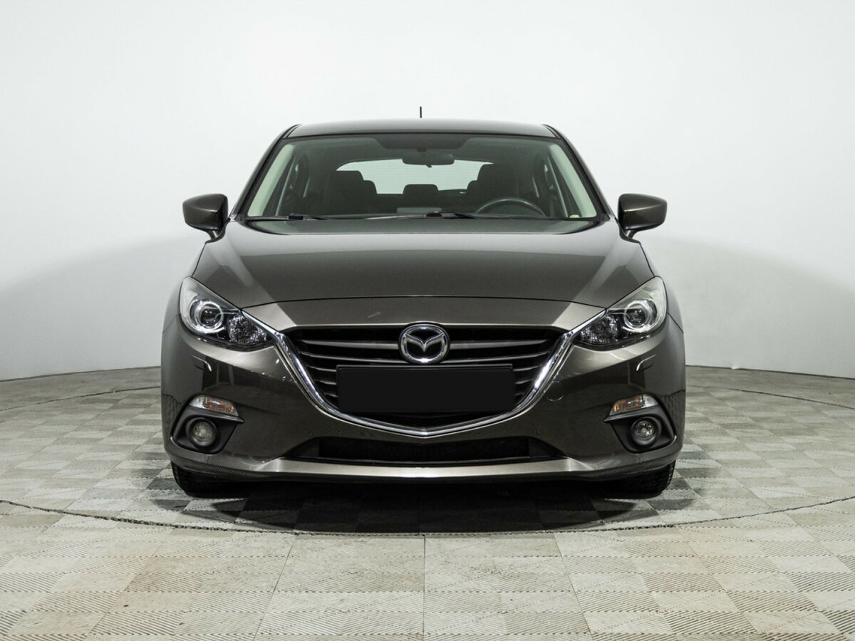 Mazda 3 с пробегом — 2013 год. Фото: #1