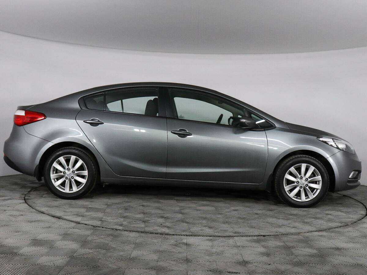 Kia Cerato с пробегом — 2014 год. Фото: #3