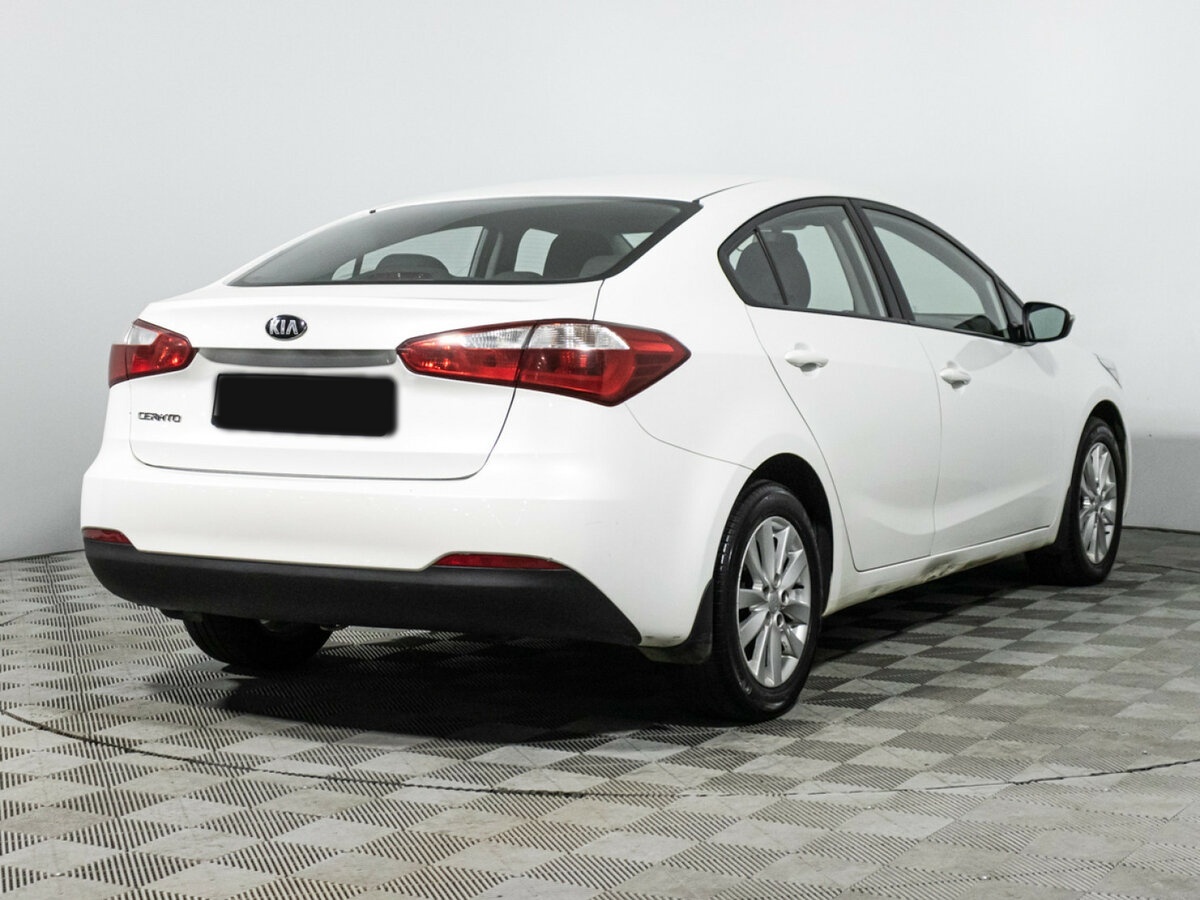 Kia Cerato с пробегом — 2015 год. Фото: #4