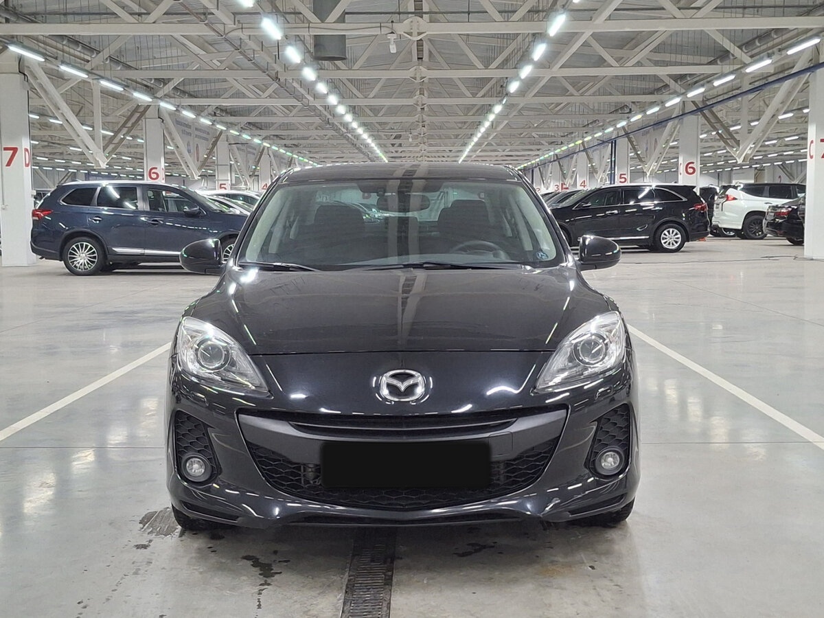 Mazda 3 с пробегом — 2013 год. Фото: #1