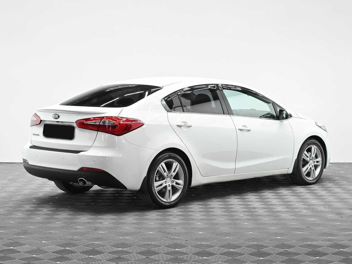 Kia Cerato с пробегом — 2013 год. Фото: #2