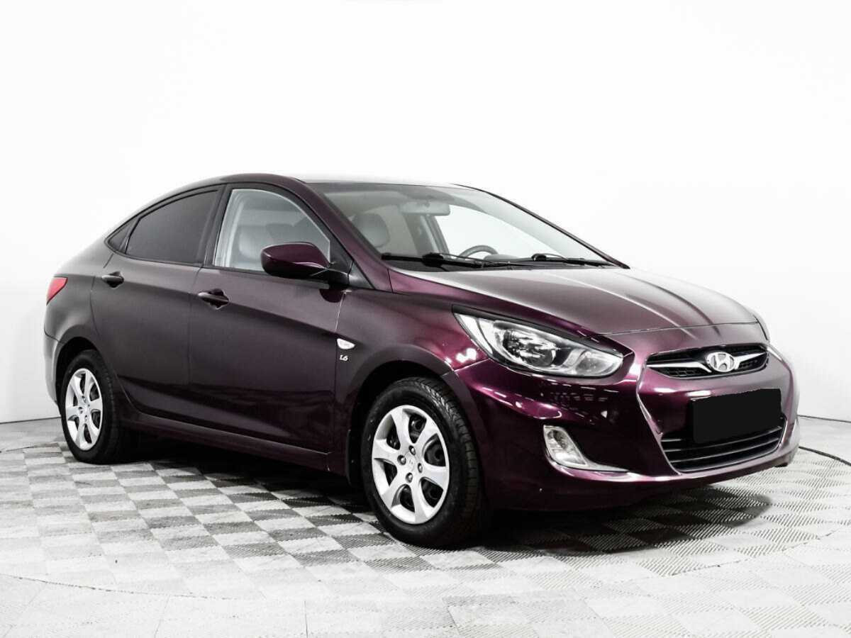 Hyundai Solaris с пробегом — 2013 год. Фото: #2