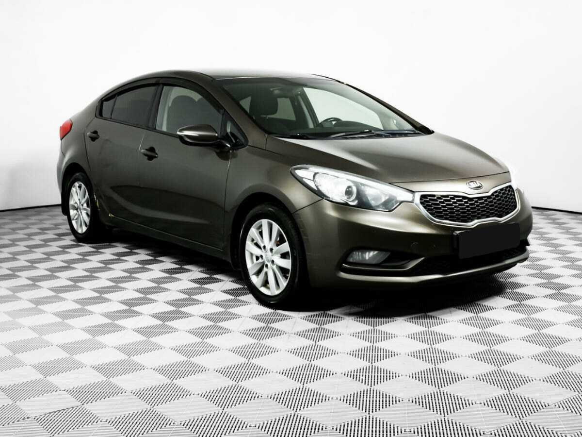 Kia Cerato с пробегом — 2014 год. Фото: #2
