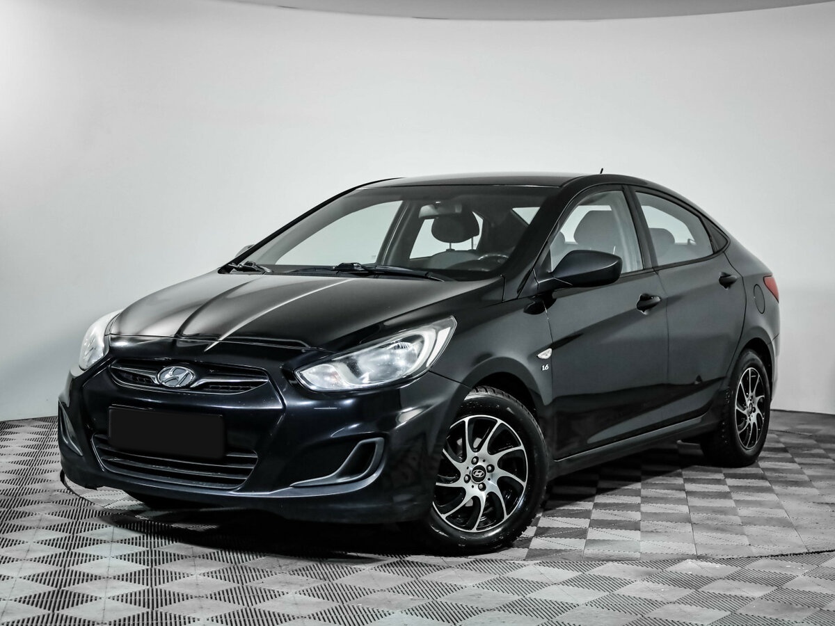 Hyundai Solaris с пробегом — 2013 год. Посмотреть фото