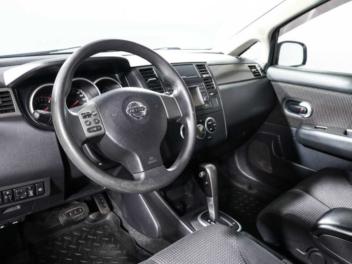 Nissan Tiida с пробегом — 2013 год. Фото: #11