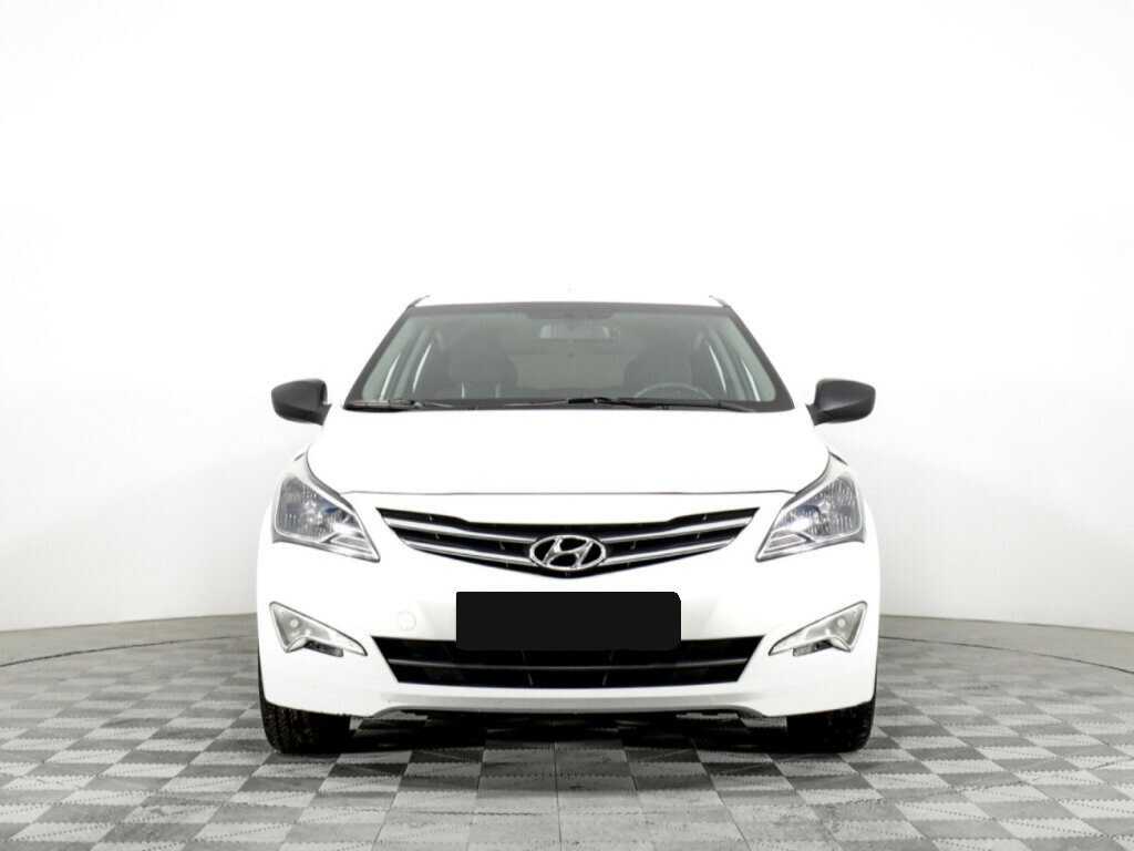 Hyundai Solaris с пробегом — 2014 год. Фото: #1