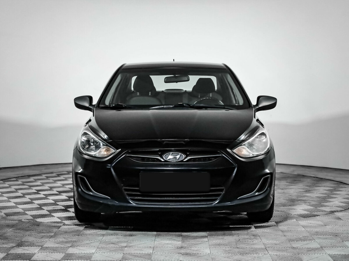 Hyundai Solaris с пробегом — 2013 год. Фото: #1