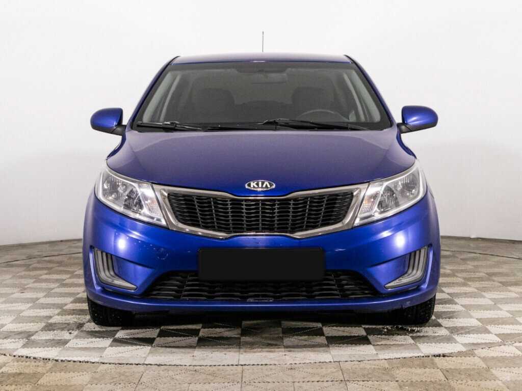 Kia Rio с пробегом — 2013 год. Фото: #1