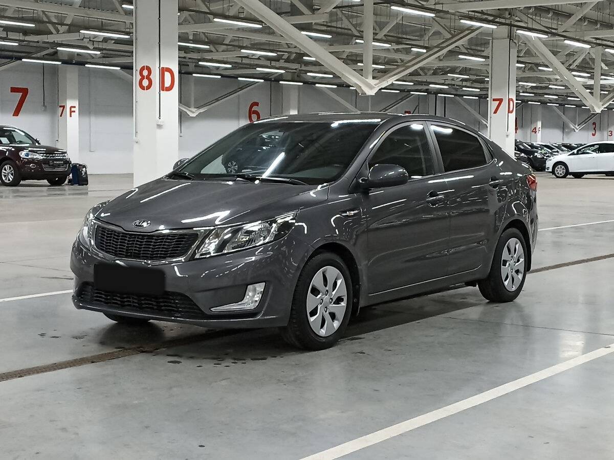 Kia Rio с пробегом — 2013 год. Фото: #0