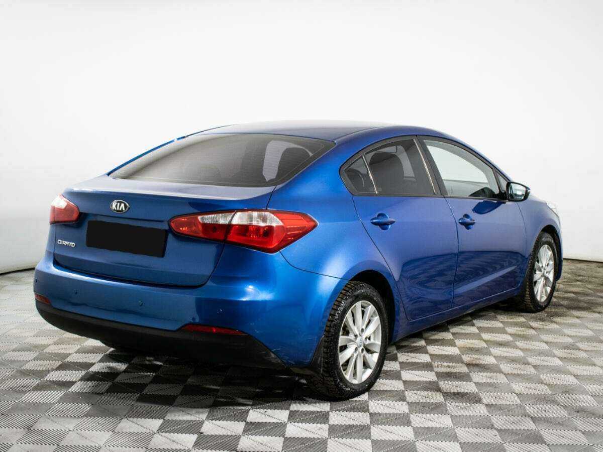 Kia Cerato с пробегом — 2014 год. Фото: #4