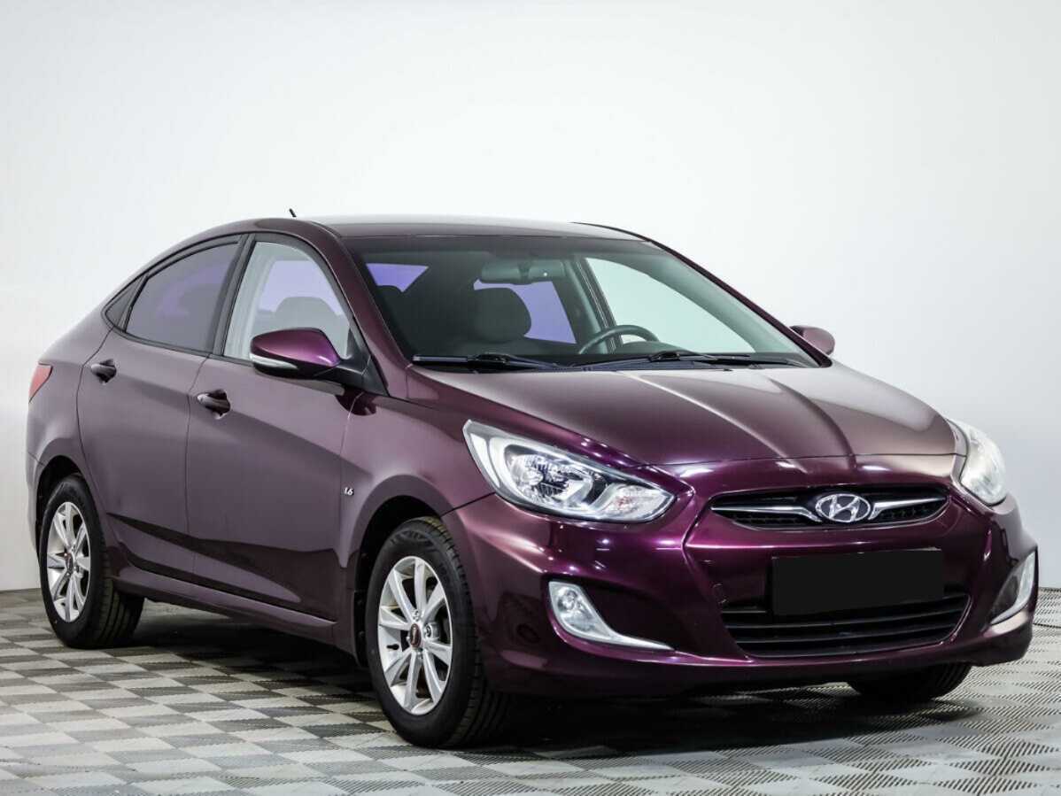 Hyundai Solaris с пробегом — 2012 год. Фото: #1