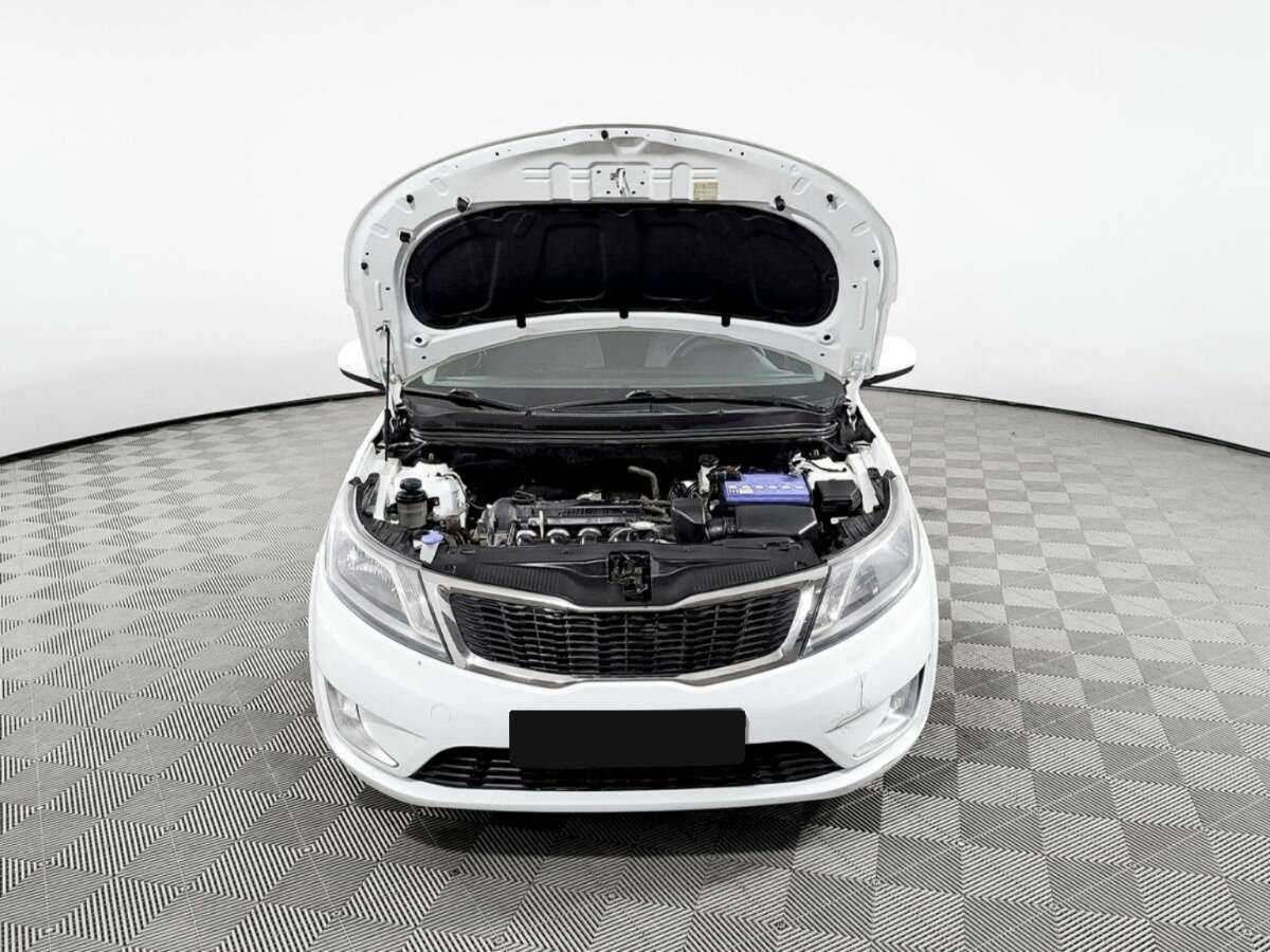 Kia Rio с пробегом — 2013 год. Фото: #8