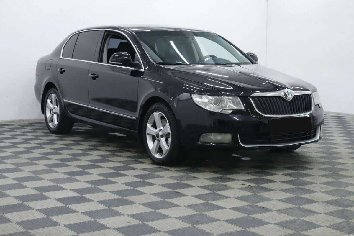 Skoda Superb с пробегом — 2013 год. Фото: #1
